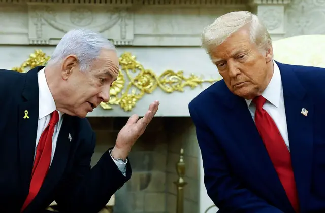 Benjamin Netanyahu talks with Donald Trump during a meeting at the White House on April 7, 2025 at Washington DC